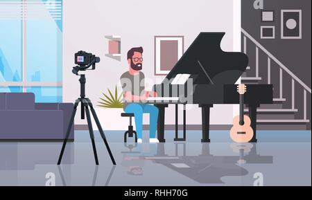 guy musical blogger recording video on camera man playing classical piano music blog concept modern apartment interior full length horizontal Stock Vector