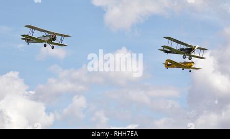 Avro 621Tutor, Miles Magister and DH.51 'MISS KENYA' flying in formation at Shuttleworth 2017 Edwardian Pageant Stock Photo