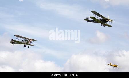 Avro 621Tutor, Miles Magister and DH.51 'MISS KENYA' flying in formation at Shuttleworth 2017 Edwardian Pageant Stock Photo