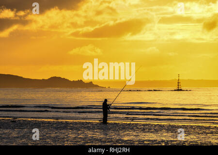 Longrock, Cornwall, UK. 3rd Feb 2019. UK Weather. It was 4 degrees C on a sunny start to the day in the south west of Cornwall. There were people out fishing, jogging and walking their dogs on the beach. Credit: Simon Maycock/Alamy Live News Stock Photo