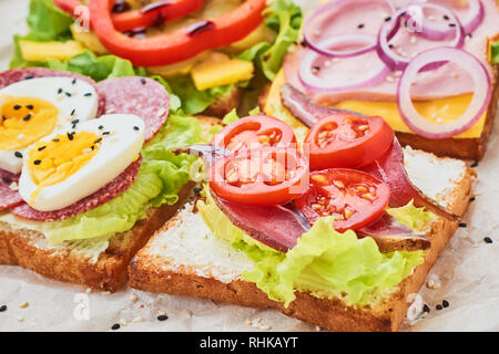 Different kind of sandwich on white background Stock Photo