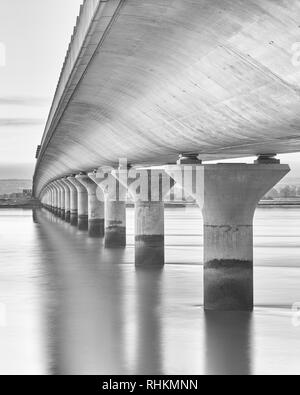 The Clackmannanshire Bridge viewed from the Fife / Clackmannanshire side, Scotland.  Long exposure black and White Stock Photo