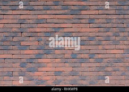 Background brick wall without cement joints Stock Photo