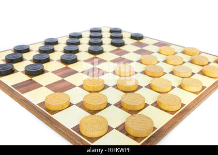 Checkerboard filled with dam stones isolated on white background Stock Photo
