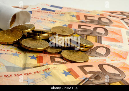 Euro notes and coins Stock Photo