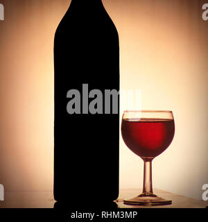 Red wine bottle and wine glass, silhouette Stock Photo