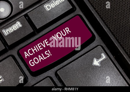 Writing note showing Achieve Your Goals. Business photo showcasing accomplish goal or to do something you set out be done Keyboard key Intention to cr Stock Photo