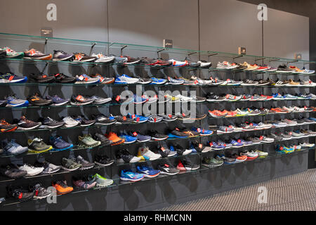 A display of running shoes for sale at Paragon Sports in Manhattan, New York City. Stock Photo