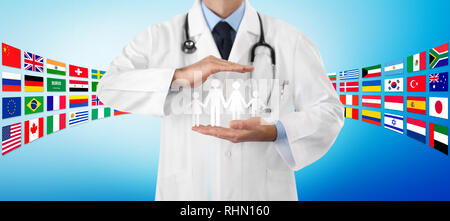 international travel medical insurance concept, doctor's hands protect a family icon, on blue background with flags Stock Photo