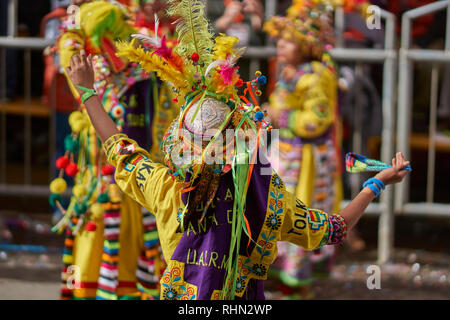 Tinkus dancers in colourful costumes performing at the annual Oruro Carnival. The event is designated by UNESCO as being Intangible Cultural Heritage Stock Photo