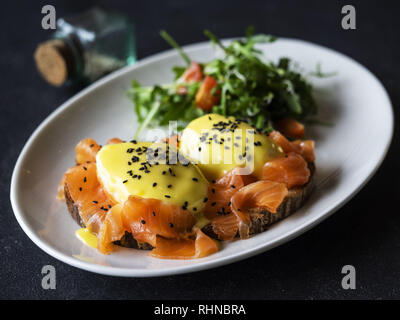 Kiev, Ukraine. 28th Jan, 2019. Sandwich with benedict and salmon seen served on a plate. Credit: Igor Golovniov/SOPA Images/ZUMA Wire/Alamy Live News Stock Photo
