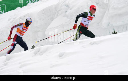 Klingenthal, Germany. 03rd Feb, 2019. Nordic Combined, World Cup, Single, Large Hill, 10 km. Manuel Faißt from Germany runs in front of Jarl Magnus Riiber from Norway. Credit: Hendrik Schmidt/dpa-Zentralbild/ZB/dpa/Alamy Live News Stock Photo