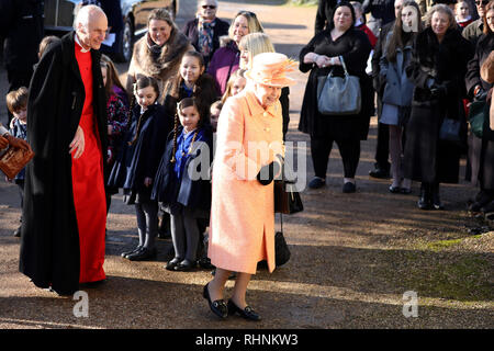 West Newton, Norfolk, UK. 3rd February, 2019. HM Queen Elizabeth II is all smiles as she meets crowds of wellwishers after Sunday morning service at St Peter and St Paul church at West Newton, Norfolk, on February 3, 2019. Credit: Paul Marriott/Alamy Live News Stock Photo