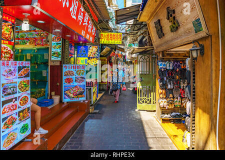 XIAMEN, CHINA -OCTOBER 09: Local shopping street with restaurants and stalls near Zhongshan Road on October 09, 2018 in Xiamen Stock Photo