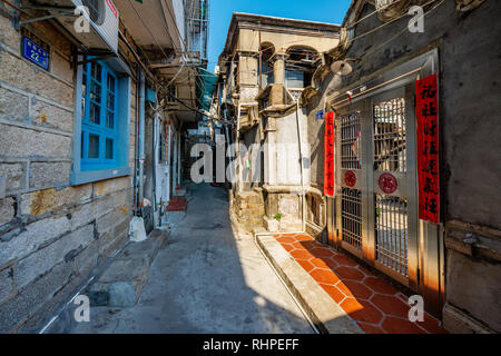 XIAMEN, CHINA -OCTOBER 09: Old alley with traditional houses near the Shapowei fishing village on October 09, 2018 in Xiamen Stock Photo