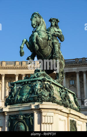 Equestrian statue of Prince Eugene of Savoy on Heldenplatz in Vienna, Austria with the Hofburg palace in the background Stock Photo