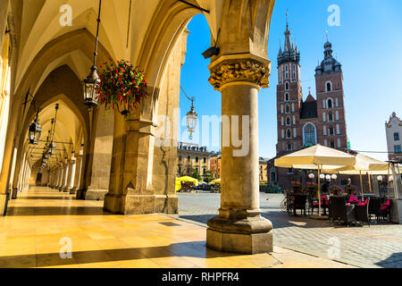 Cloth Hall and St. Mary's Basilica on main Market Square in Krakow, Poland Stock Photo