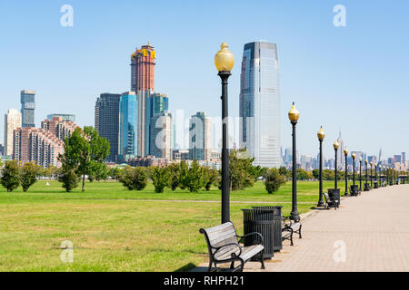 Skyline of Jersey City, New Jersey along path in Liberty State Park Stock Photo