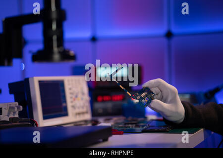 Repair cell phone pcb Stock Photo