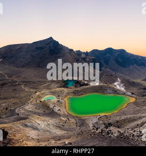 Sunrise at the Emerald Lakes at the popular Tongariro Alpine Crossing hike in New Zealand Stock Photo