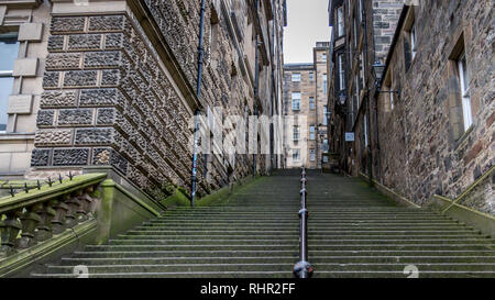 The countless Sandstone steps of Warriston Close connects Cockburn Street to the old town's Royal Mile in Edinburgh's fine architectural ancient city Stock Photo