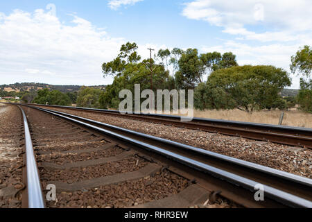 Railway tracks in a rural scene up in the Perth Hills Western Australia Stock Photo