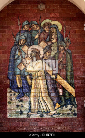 Stations of the Cross: Jesus carrying the cross on his back; A panel of Portuguese tiles outside the shrine of Fatima Stock Photo