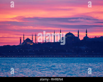 Landmarks of Istanbul at sunset: Hagia Sophia and Blue Mosque Stock Photo