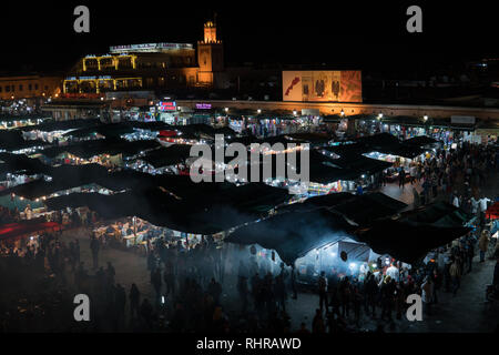 MOROCCO - MARRAKECH JAN 2019: Night view of Djemaa el Fna, a square and market place in Marrakesh medina quarter