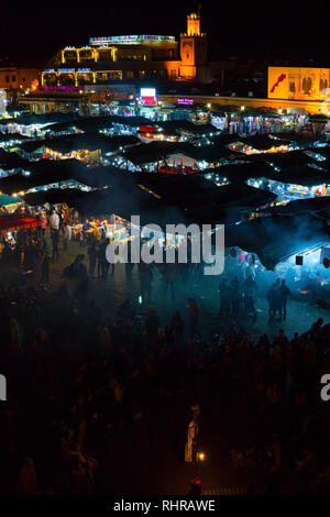 MOROCCO - MARRAKECH JAN 2019: Night view of Djemaa el Fna, a square and market place in Marrakesh medina quarter