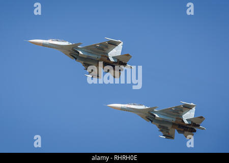 International military technical forum ARMY-2018. A pair of SU-34 aircrafts perform demonstration flights in the sky over a military training ground Stock Photo