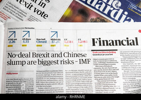 'No-deal Brexit and Chinese slump are biggest risks - IMf'  Financial page article in Guardian newspaper London England UK   22 January 2019 Stock Photo