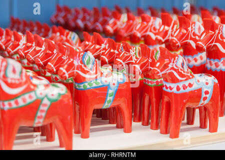 Mora, Sweden. 02/15/2017. The Dala Horse Factories of Nusnäs. Where Sweden’s most famous souvenir is being made. Ready made product on display in shop. Stock Photo