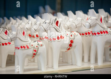 Mora, Sweden. 02/15/2017. The Dala Horse Factories of Nusnäs. Where Sweden’s most famous souvenir is being made. Ready made product on display in shop. Stock Photo