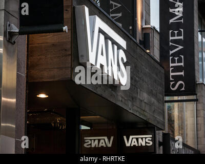 MONTREAL, CANADA - NOVEMBER 5, 2018: Vans logo on their main shop for Montreal, Quebec. Vans is an american footwear, shoes and apparel company specia Stock Photo