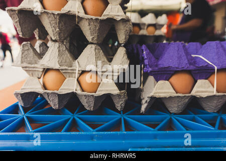 Close up of a display of fresh cage-free, free-range chicken eggs for sale at the Farmer's Market in Montrose, near Los Angeles, California Stock Photo