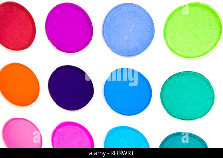 These colorful dots are close up of watercolor pans in a white palette - a rainbow of dots making a beautiful abstract pattern. Creative and cheerful Stock Photo