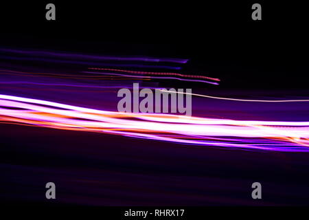 Abstract light painting photography, curves and waves abstract light against a black background Stock Photo