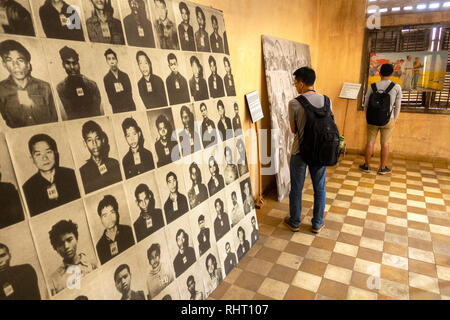 Cambodia, Phnom Penh, Street 113, Tuol Sleng genocide museum, display of final victims’ photographs in classrooms of former Tuol Svey Prey High School Stock Photo