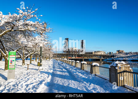 PORTLAND, OR - JANUARY 12: Tom McCall Waterfront Park covered in snow on January 12, 2017 in downtown Portland, OR Stock Photo