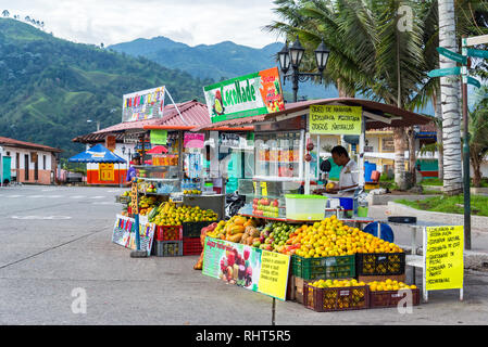 SALENTO, COLOMBIA - JUNE 6: Stands selling juice in the plaza in Salento, Colombia on June 6, 2016 Stock Photo
