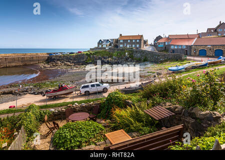 The coastal village of Craster, Northumberland, England, UK, muddy ...