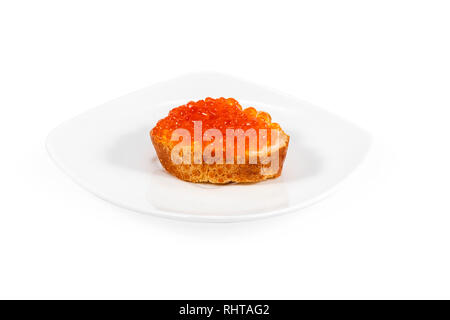 sandwich with red caviar on a white plate isolated on white background Stock Photo