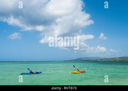 Kayakers at Pigeon Point Heritage Park on Tobago island, Trinidad and Tobago. Stock Photo