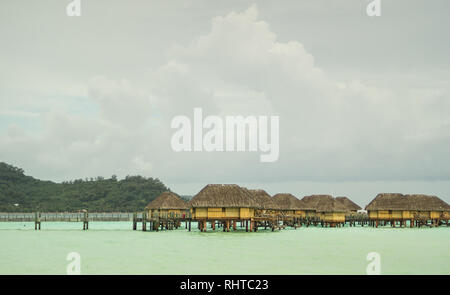 View of the over-water bungalows at Pearl Beach Resort in Bora Bora Stock Photo