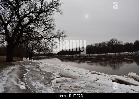 Ice chunks floating down the Wabash River in Terre Haute, Indiana during the polar vortex. January 2019 Stock Photo