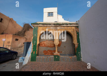 Rabat, Morocco. Beautiful old damaged moroccan fountain inside the Kasbah of the Udayas ancient fortress in Rabat , capital of Morocco. Stock Photo