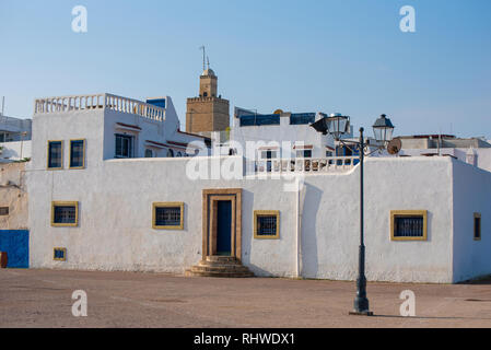 Beautiful old white houses and mosque AL KASBAH inside the Kasbah of the Udayas ancient fortress in Rabat , capital of Morocco. Stock Photo