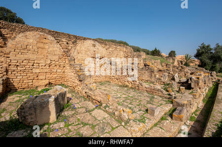 Minaret of the mosque in Chellah or Sala Colonia is a medieval fortified necropolis located in Rabat, Morocco. Park with old ruins and history forum Stock Photo