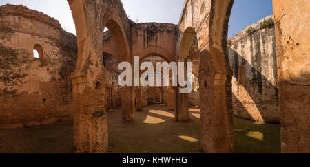 Minaret of the mosque in Chellah or Sala Colonia is a medieval fortified necropolis located in Rabat, Morocco. Park with old ruins and history forum Stock Photo